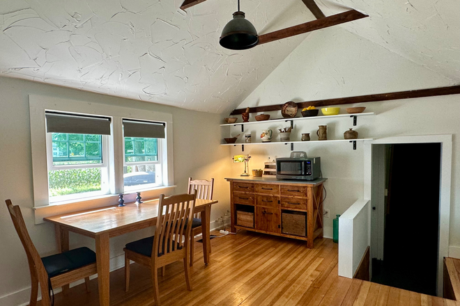 Shared dining room with table, chairs & microwave - Private & Spacious Upstairs Bedrooms in a Recently Remodeled Luxury Farmhouse 1.9 Miles t