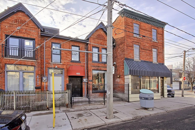 Building 415 with black door as its entrance - Modern One-Bedroom Entire Unit on the Second Floor of a Detached House