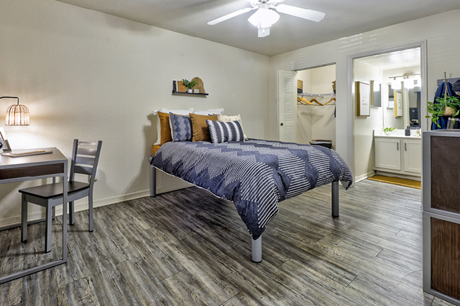 Model bedroom with a view of the closet and bathroom. - Mercury 3100 3x3A (Men's)