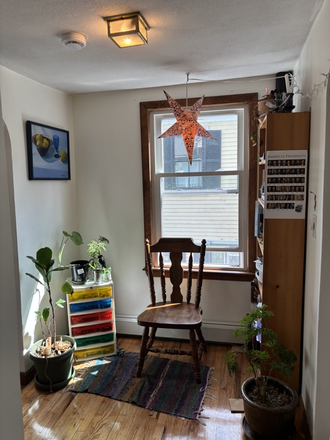 Nook at bottom of stairs - Bright and airy apartment close to MIT
