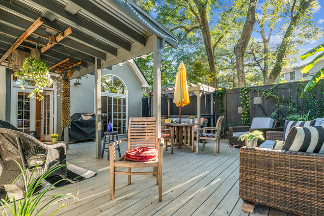 patio with grill and porch swing - Heron Lake, walking distance to Ravenel Bridge, furnished,  custom home, one year executive rental.