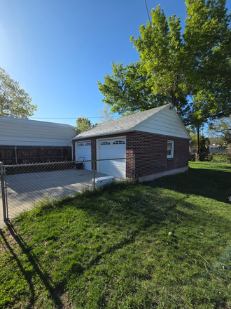 Garage and Backyard - URGENT: Two roommates needed! Spacious 3-bedroom home in Millcreek with move-in June 1!