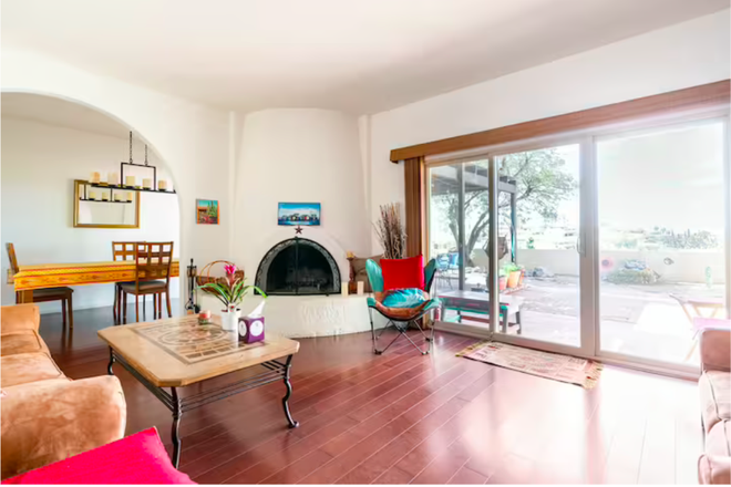 Living Room overlooking the city - Healthy, Fully-furnished Townhome in the Catalina Foothills