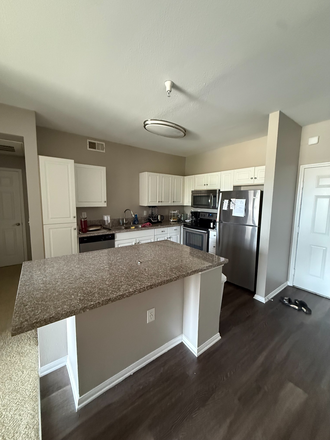 kitchen island - regents court Apartments