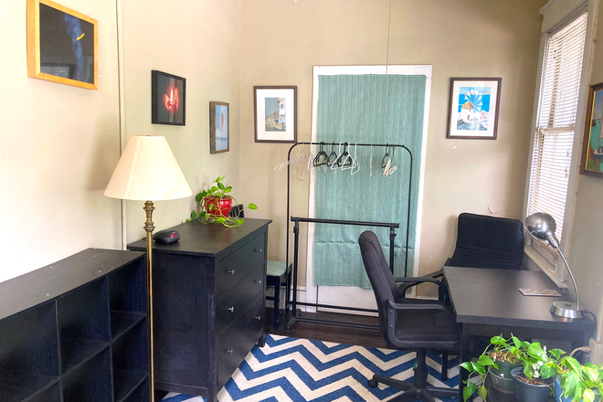Bedroom (unused door that goes to building hallway - Charming affordable room in a great location Apartments
