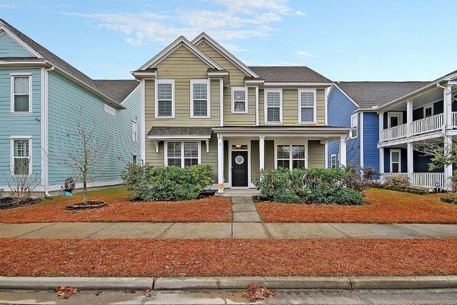 Front view - Spacious 3BR + Office in Carolina Bay with Garage, Porches, and Community Amenities