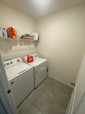 House Laundry Room - Furnished Master Bedroom with Bathroom