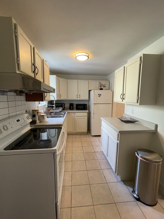 Kitchen - Private Fully Furnished Guest House with Beautiful Deck and close to public transportation- by owner