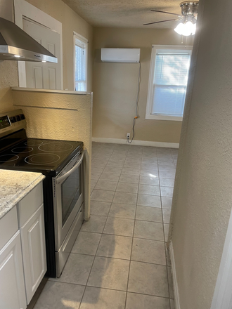 Kitchen view to Bedroom/Living Room - Casita: Ready for move-in! (Bills Included) Apartments