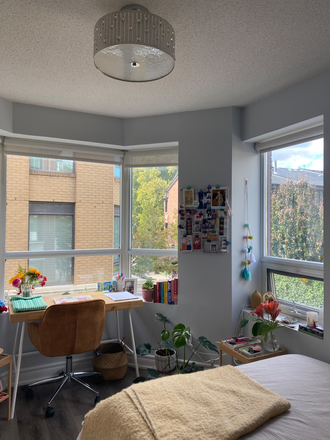 Bedroom, has bay windows that are North-west facing, desk and chair are included - 1 Furnished Bedroom in a 3-Bedroom Apartment with in-unit Laundry and Close to Campus