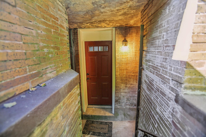 Outside front door - Location Location Location! Apartments