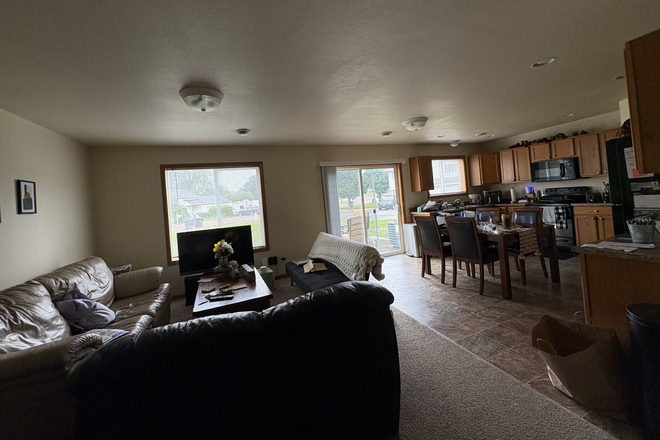 Main living area + kitchen - Agency Road Apartments