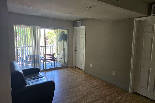 living space + patio - Knights Circle Apartments