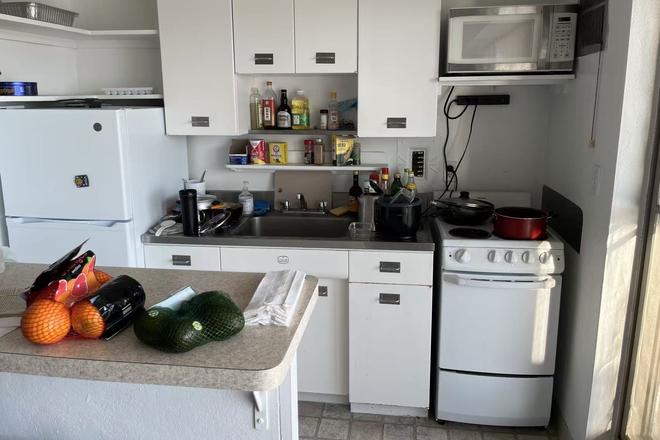 Kitchen - Large River-View Living Room Close to Campus Apartments