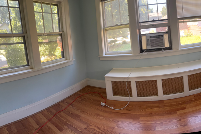 Bedroom/sunroom - Ashland/Moore Unit- Beautiful and Historic 1+ Bedroom Apartments