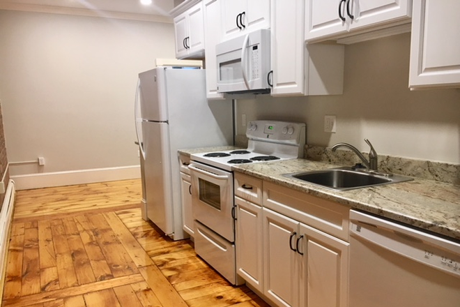 Granite kitchen - Avail. July 1, 2026 Newly renovated  four bedroom two full bathroom in the center of Amherst!