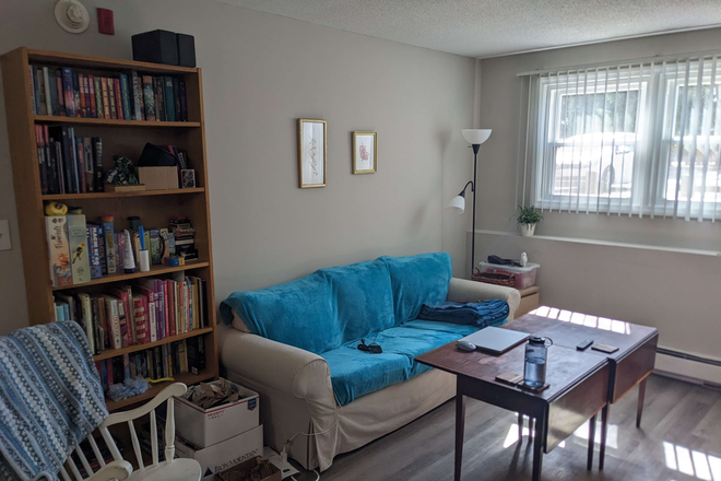 Living Room - End Unit Apartment at Sugarloaf Estates