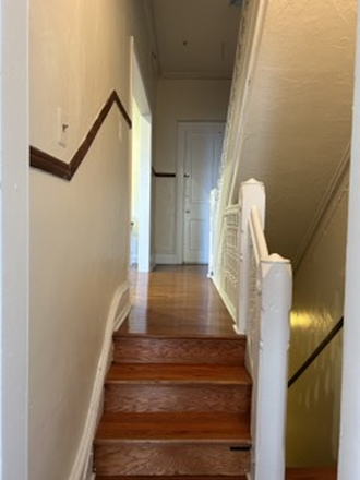 stairs between living room and kitchen - Gorgeous House near Penn's campus