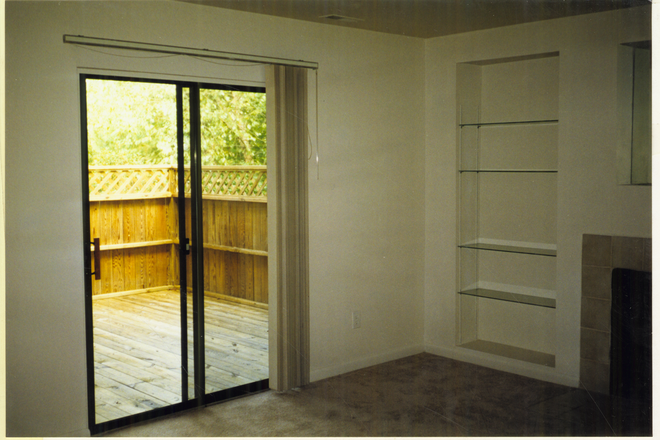 side of living room and window - 3 bedroom Finley Forest condo on Friday Center busline