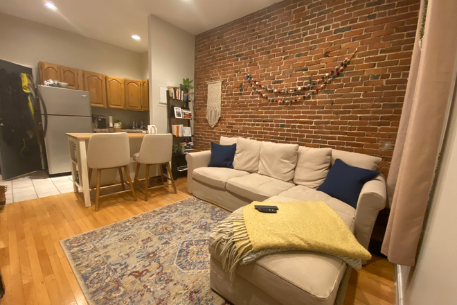 1 - One bedroom on Symphony Road with a loft, private deck, high ceilings, exposed brick