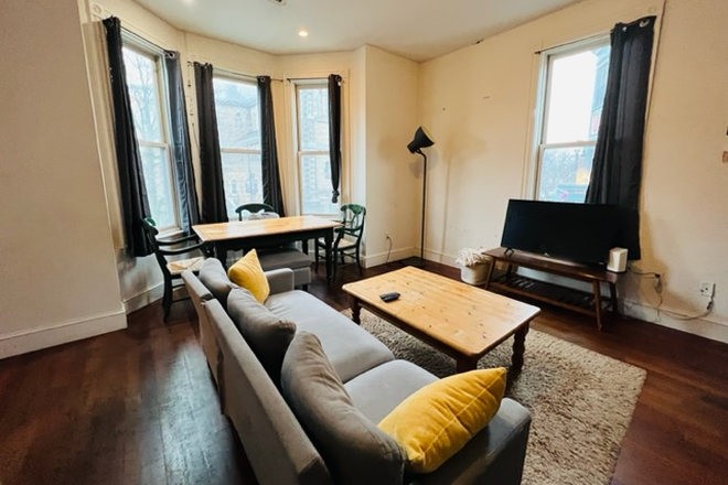 Living Room - Four Bedroom with Two Full bathrooms and Central A/C  Parking available