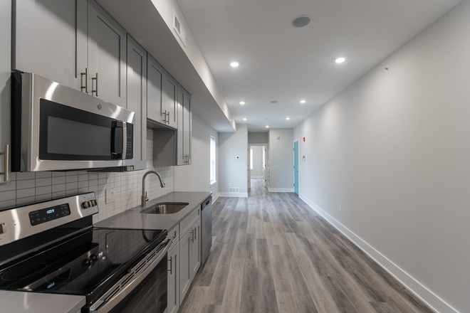 Kitchen-Dining-Living area with front bedroom in view - Fairly New 2-bed, 2-bath apartment near Drexel and UPenn, Available 9/1/2026