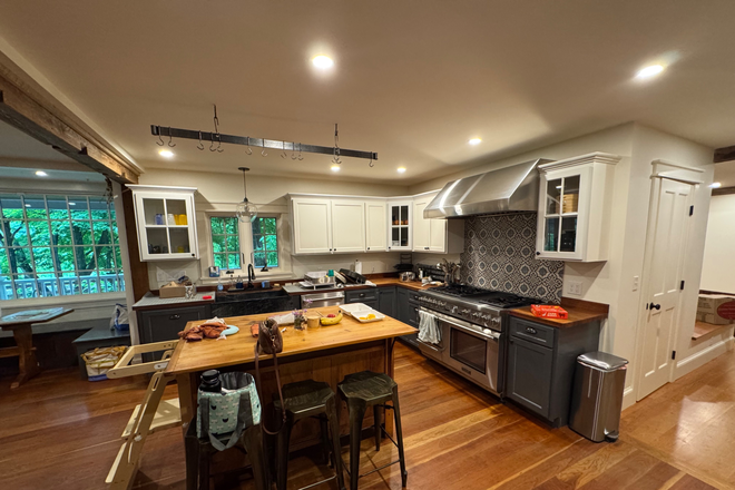 Kitchen- leading to apartment - Apartment in Renovated Farm House