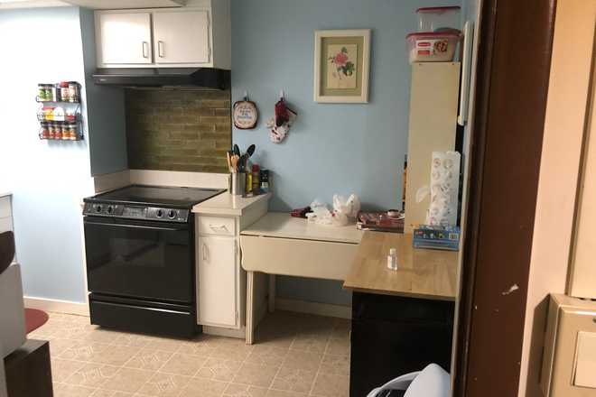 Eat-In Kitchen with table - 1 Bedroom Private Apt with large living/work area in Private Home walking distance to Campus.