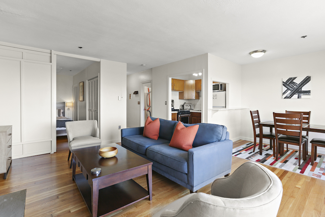 Living Room and Dining - Furnished 1 Bedroom with Sprawling Charles River Views Apartments