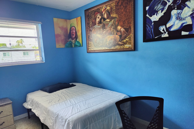 Sunlit front bedroom is right across from the shared bathroom. - Bedroom $1,200/mo includes utilities, Wi-Fi, Onsite parking & Washer/Dryer. Safe neighborhood.