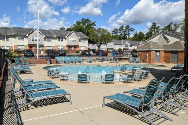 Pool w/ Townhouses in Background - University Suites - Private Bedroom/Bathroom in Townhouse near Centennial Campus (Male Preferred)