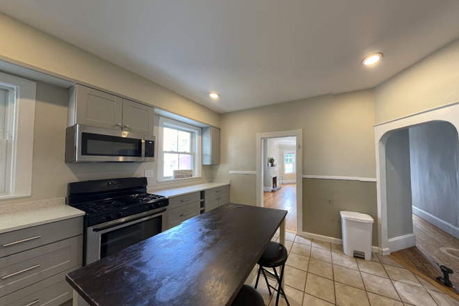 Call NOW for showings! 617-236-8550 - DURHAM ST - LRG & SUNNY FLOOR THRU 3BR/1BA AVAIL *9/1/2026* W/ LNDRY IN BLDNG, PRKNG, DECK, EIK, DW Apartments