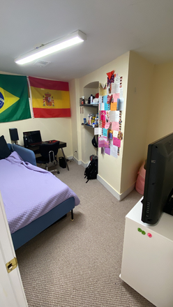 Bedroom 3 (Listing) with Bed, Desk, Dresser, and TV - Townhouse close to campus