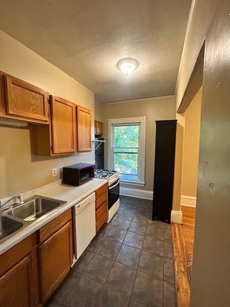Kitchen 1 - 3-BR UpperDuplex;1/2 mile to campus; landlord pays all utilities! $750 per BR or less w/more pple Duplex