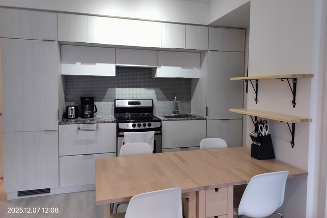 Kitchen - Fully Furnished Modern 2Bed 2Bath well laid out Downtown Condo