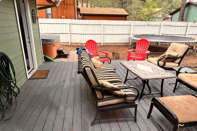 Back patio and yard - Kachina Village 1 bedroom fully furnished newly remodeled