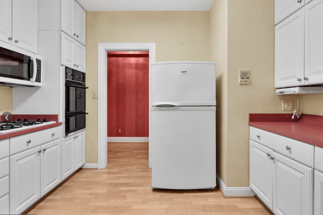 Kitchen (there is a laundry room, pantry and fire-escape through the kitchen - Across from Homewood Campus, Redbrick building