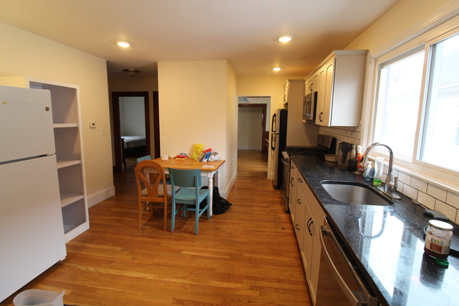 3 - Spacious top floor with fenced in yard, parking, near T. Apartments