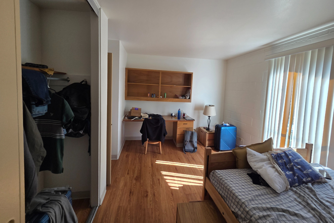 room and desk - Smiley Court Apartments