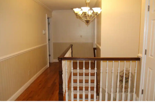 Hall way up stairs - Perfect Location For Hostra Students House