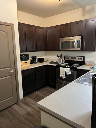 Kitchen - Progress 910 Apartments