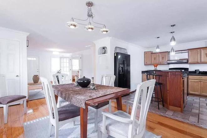 Dining Room - 5 bed TRIPLEX on Fort Ave! Parking, laundry, private deck & more! Apartments
