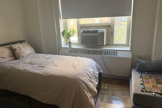 Bedroom with a huge window - A room in Stuytown, the oasis in Manhattan Apartments