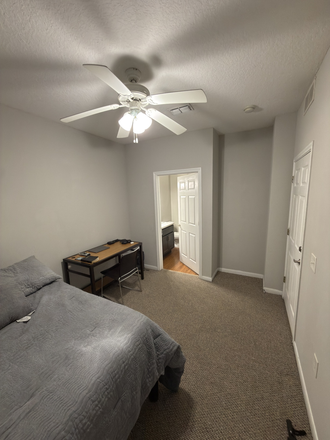 Bedroom from corner - Alight Gainesville Apartments