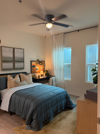 The bedroom looks right off onto Highway 105 but you do not hear the road itself as it lays further back. - Boone Student Living