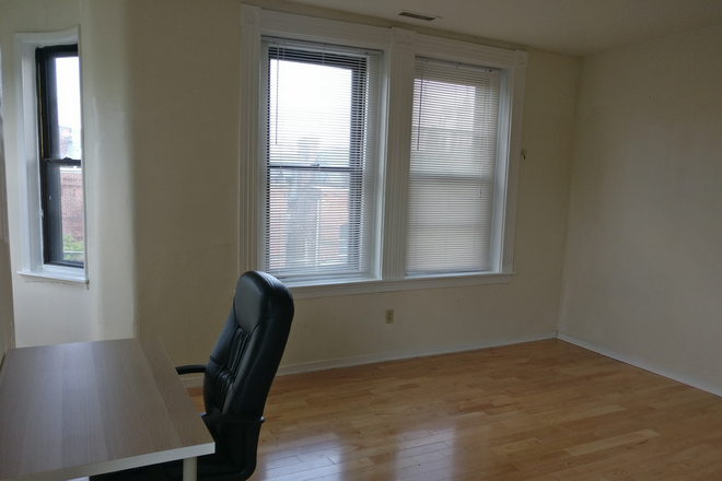 Large Bedroom - New!! Large 1 Bd + Study/Den + hardwood with Central AC + On-site Laundry Apartments