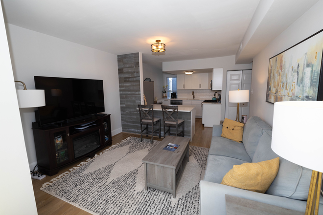 Living Room/View to Kitchen - Renovated Hip H Street Condo-Fully Renovated