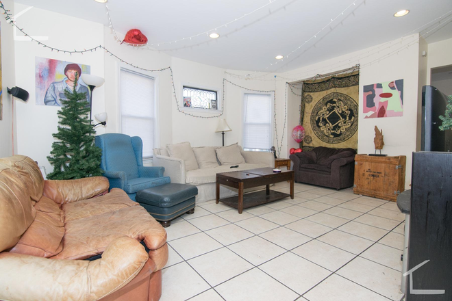 Living room - Spacious 6 bed 2 bath 9/1/2025 Apartments