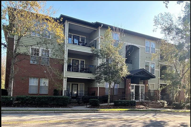 Outside Street View of Building - Campus View Condo