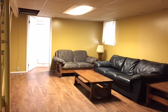 Living room - Large 3 bed Room Apt all utilities included Fully Furnished